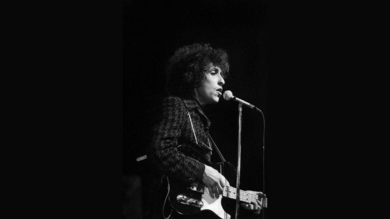 American rock and folk musician Bob Dylan performing on May 25, 1966 during a concert at the Olympia music hall in Paris